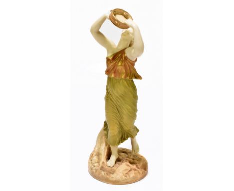 ROYAL WORCESTER; a bisque porcelain figure, female Bacchante with tambourine, gilt heightened, printed green mark and numbere