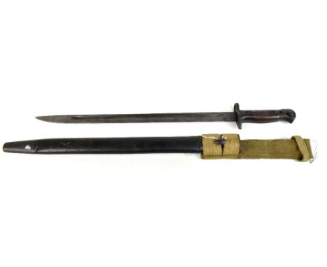 A British WWI military issued bayonet, the fullered blade with stamped royal cipher and date of 1907 with further markings to