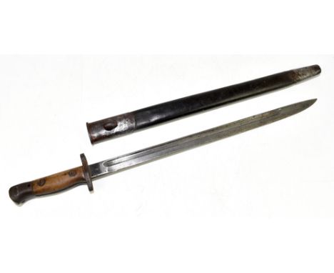 A 1907 pattern military issued Anderson bayonet with fullered blade in metal mounted leather scabbard, length 55cm.Additional