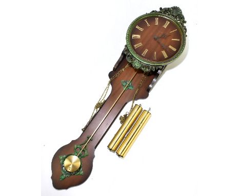 HERMLE; a modern oak effect wall clock, the circular dial applied with Roman numerals, height 100cm together with a barometer