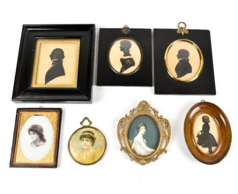 Four 19th century silhouettes comprising one of a gentleman turned to sinister, a further miniature of a gentleman turned to 