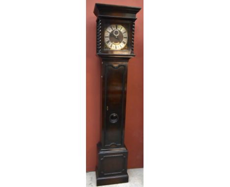 An early 20th century oak longcase clock, the brass face with silvered dial set with Roman and Arabic numerals with subsidiar