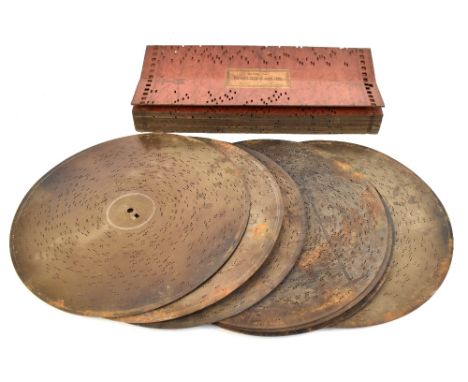 Seven 11 3/4" polyphon discs including 'The Shop Girl Waltz' by P. Bucalossi, 'Onward Christian Soldier', 'Sacred Song' by H.