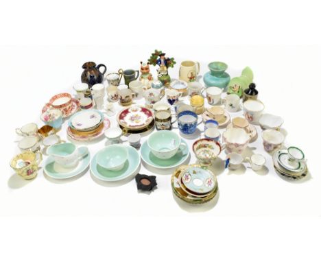 An assortment of decorative cups and saucers, vases, jugs and model animals, including a Carlton Ware four section toast rack