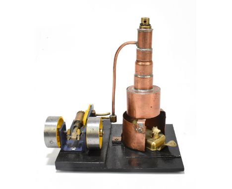 A contemporary scratch built steam engine, with copper chimney, raised on a black painted wooden plinth base, length 18.5cm.