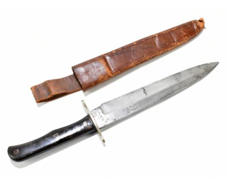 A late 19th/early 20th century Shikar hunting knife, the blade base with manufacturer’s stamp ‘W.L. & Co’, with horn grip and