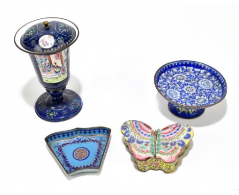 Four pieces of Chinese enamel ware comprising a pedestal vase and cover, decorated with panels of figures in interior scene, 