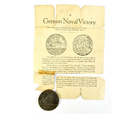 A Lusitania medal with original box and leaflet (box and leaflet af).Additional InformationBox heavily worn in several parts,