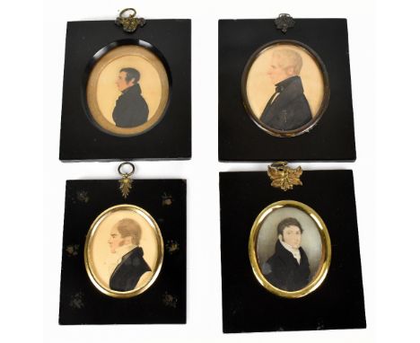 Three 19th century pencil and watercolour miniatures of gentleman, each turned to sinister, in papier-mâché frames and a wate