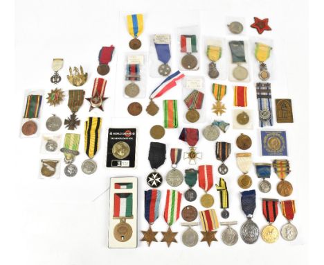 An interesting group of medals including a WWI Victory Medal awarded to 52142 Pte. R. Armstrong Liverpool Regiment (af), a Fo