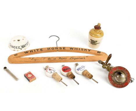 A group of whisky related collectors' items including a White Horse whisky coat hanger and a Scotch whisky C.O.B optic.Additi