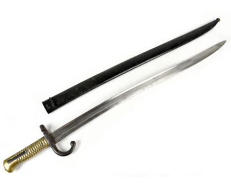 A late 19th&nbsp;century French chassepot bayonet with ribbed brass grip, the guard and scabbard bearing matching numerals, A