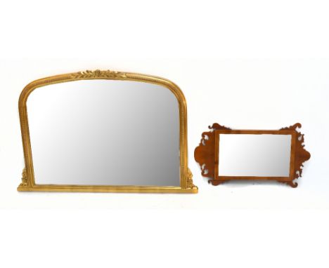 A reproduction yew wood Georgian style fret wall mirror of rectangular form, height 64cm, width 36.5cm, also a modern gilt fr