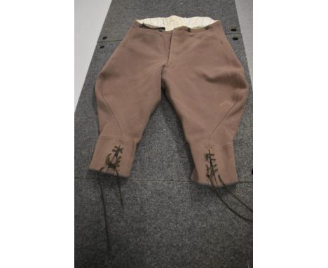 A pair of gents 1940s taupe wool breeches or jodhpurs having button fly.
