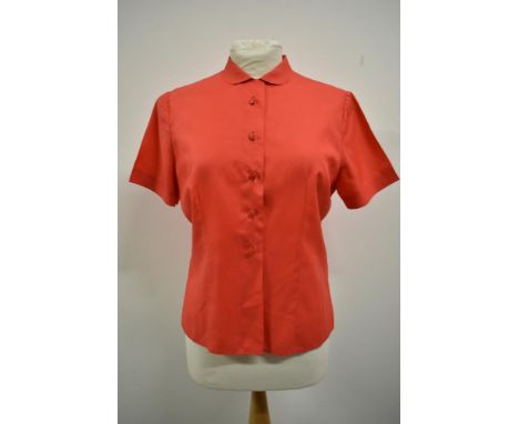 A 1950s cherry red blouse, 'Maxton regd Tricel fabric' bust size 36.