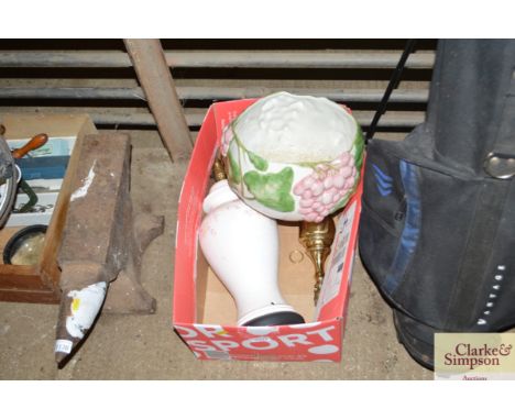 A box containing a jardinière and two lamp bases
