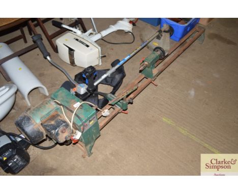 An Avon lathe, sold as collector's item and a box of various wood turning chisels&nbsp;