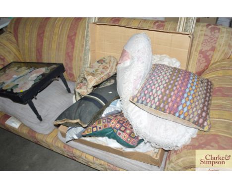 A box containing various cushions; tapestry bag etc
