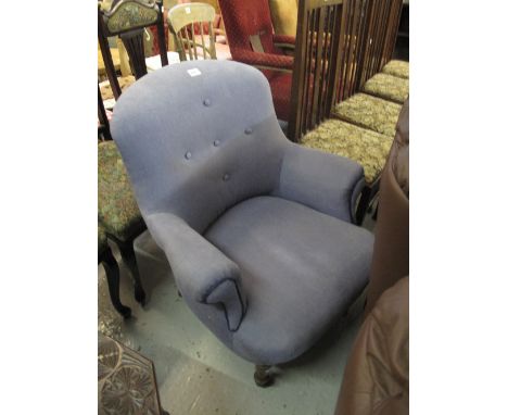 20th century button back upholstered tub type armchair or bedroom chair on metal casters. 