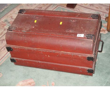Small tin trunk with carrying handles. 