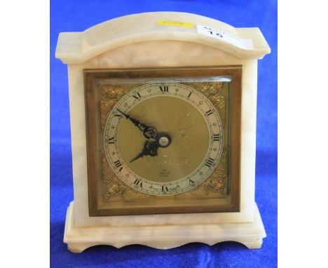 Mid 20th century Elliott white marble mantle clock with brass face and silver chapter ring. 