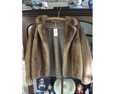 Lady's mink fur light brown jacket. 