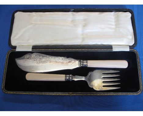 Cased fish knife and fork serving set having silver collars. 