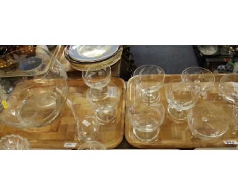 Two trays of assorted glassware to include large baluster etched foliate and fruit punch bowl and ladle, various trifle bowls