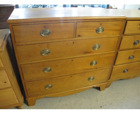 Edwardian pine chest of two short and three long drawers on bracket feet. 