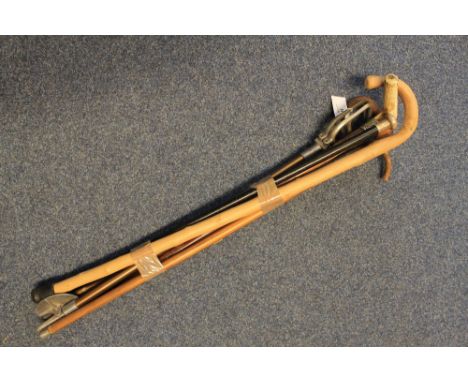 Bundle of assorted walking sticks and canes together with a Aviation Avro Whitworth Division shooting stick. 