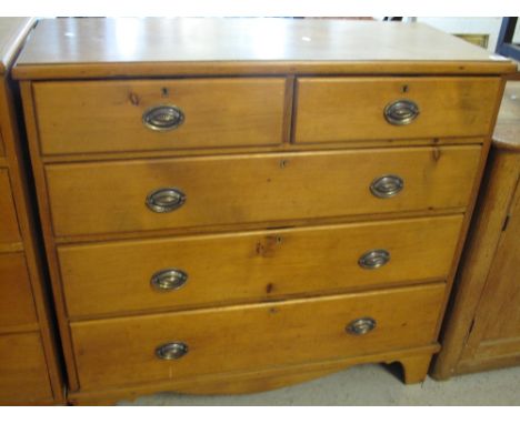 Edwardian pine chest of two short and three long drawers on bracket feet. 