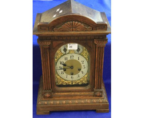 Late 19th century German oak architectural mantle clock with three train striking movement.  CONDITION REPORT: General wear, 