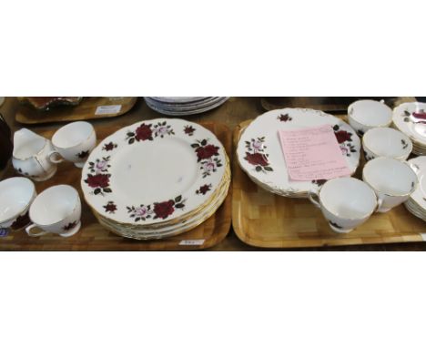 Two trays of Colclough bone china rose design part tea ware items comprising cups, saucers, side plates, dinner plates, cake 