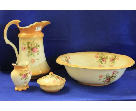 Staffordshire pottery floral transfer printed jug and basin set with tooth brush, vase and soap dish. 