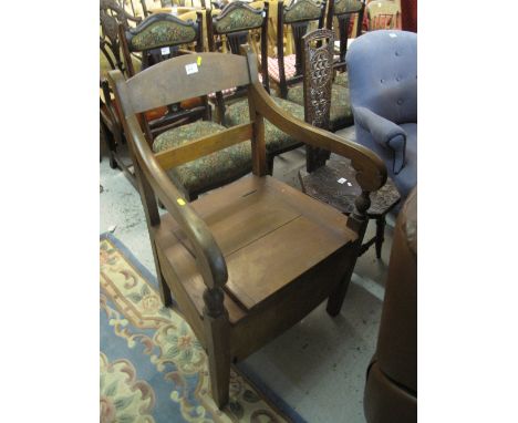 19th century mahogany bar back commode armchair. 