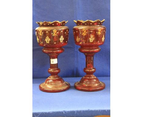 Pair of Victorian ruby glass pedestal vases originally with lustres and spangles. Overall enamelled, floral and gilded decora
