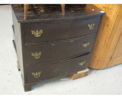 Stained bow front chest of three long drawers on bracket feet. 