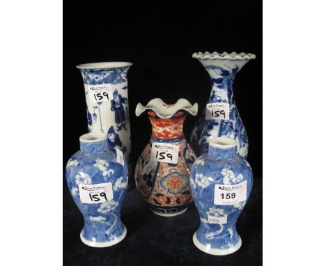 A group of five oriental vases to include four blue and white, one Imari coloured, all decorated with a mixture of flowers an