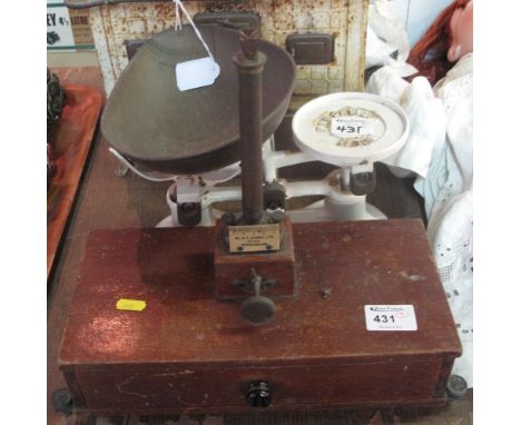 W & T Avery Ltd. Birmingham single drawer tabletop shop scales together with Boots cast iron enamel weighing scales with vari