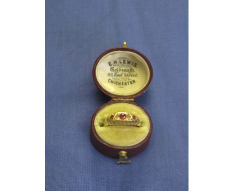 18ct gold ruby and diamond ring in box. 