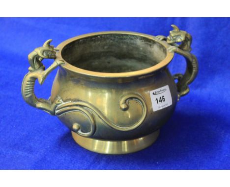 Chinese polished brass two handled baluster shaped koro or urn with dragon mounts and applied scroll work. Cast six character