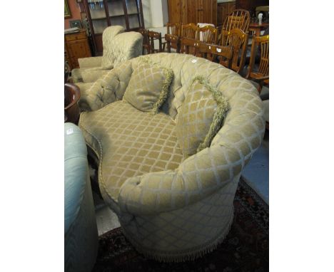 20th century geometric upholstered three piece suite comprising two seater sofa and two matching armchairs on baluster turned