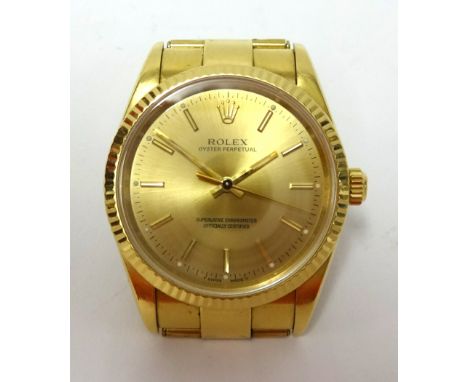 Rolex, a gents 18ct gold cased Oyster Perpetual Chronometer, wristwatch and bracelet, guarantee dated 1997 number 14238, seri