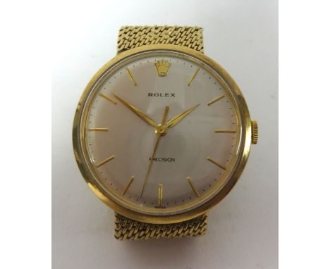 Rolex, a gents 9ct gold manual wind 'Precision' wristwatch, with baton dial, integral bracelet, 52gms circa 1965.