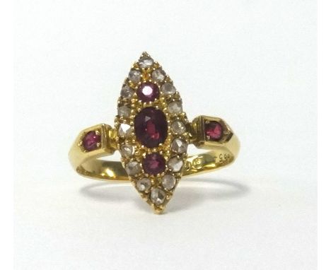 An 18ct antique ruby and diamond marquise set ring, finger size L.