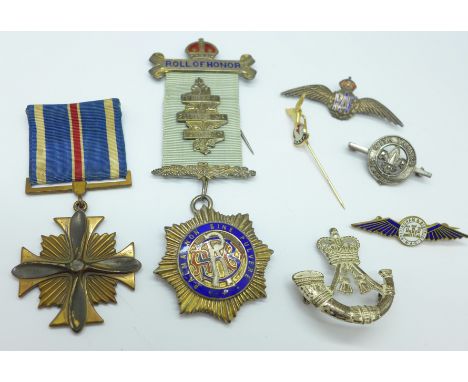 A RAF silver and enamel sweetheart brooch, a silver lodge medal, a US Distinguished Flying Cross medal to Lt. T. Budworth, Ma