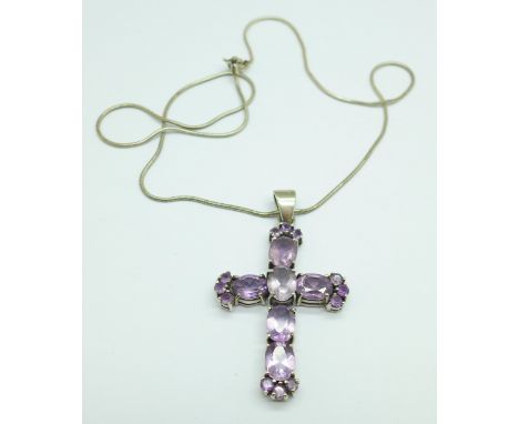 A silver and amethyst cross pendant and chain 