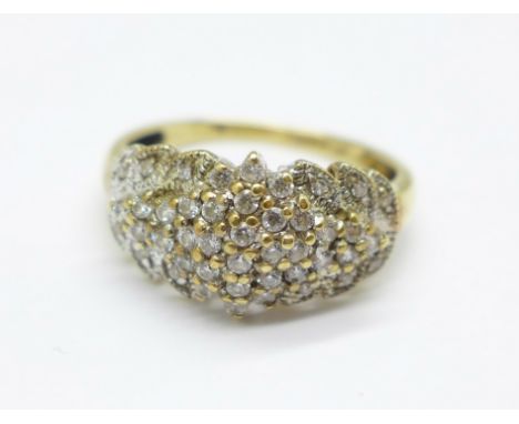 A 9ct gold and diamond ring, approximately 44 diamonds, 3.9g, R 