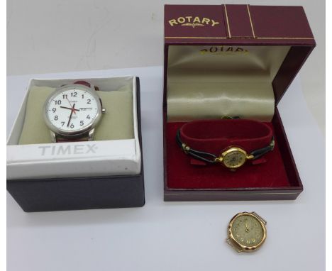 A 9ct gold cased wristwatch head, a/f, 3.5g, a lady's Timex wristwatch and a gentleman's Timex wristwatch, boxed 