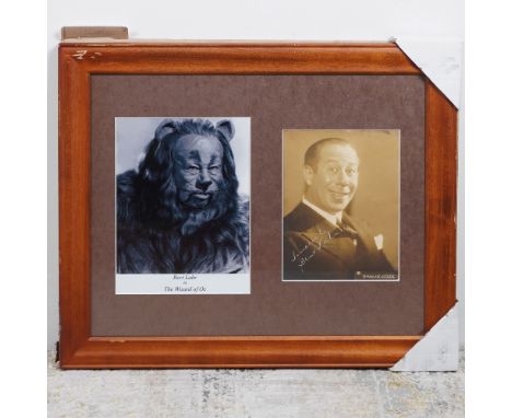 A framed Bert Lahr collectible featuring a signed vintage photograph of the legendary actor, best known for his role as The C